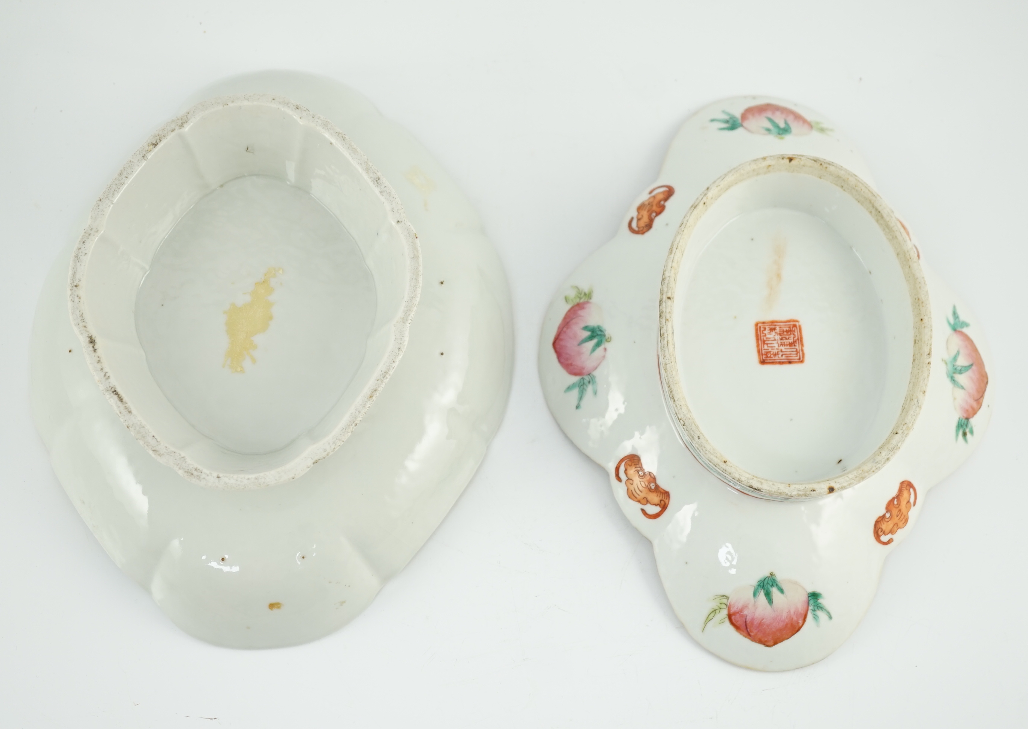 A Chinese famille rose 'butterfly and flowers' dish, Daoguang period and an iron red enamelled 'sanduo' dish, late 19th century